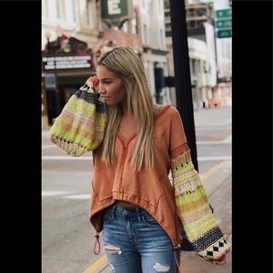 Free People sweatshirt with crochet sleeves